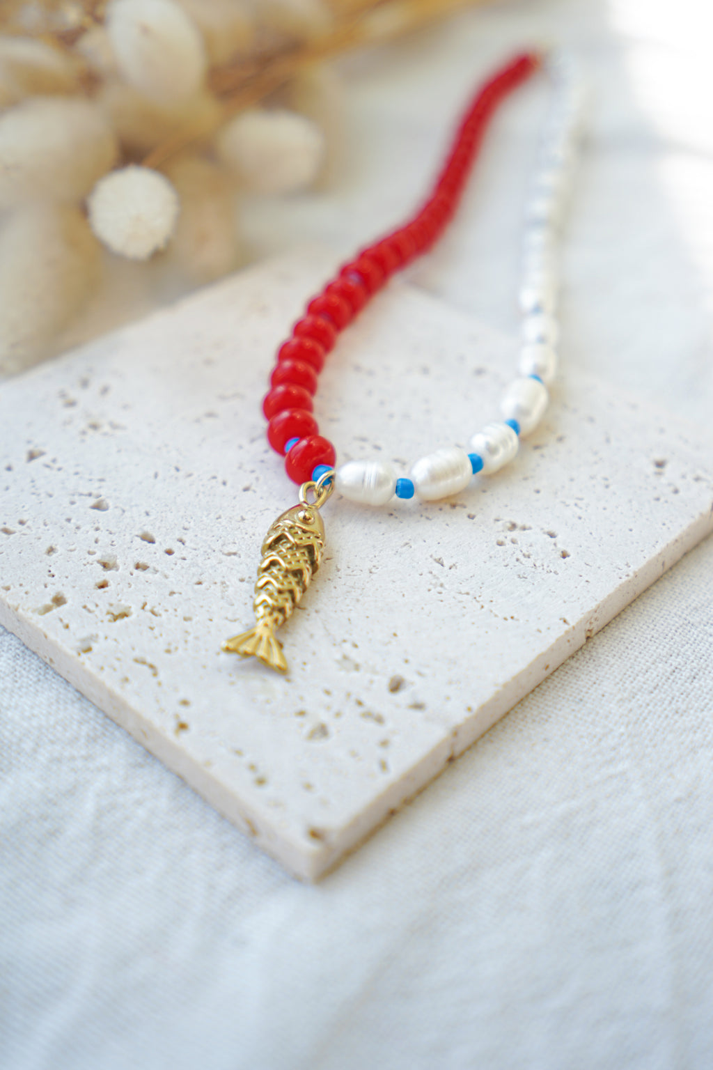 Collar azul, blanco y rojo