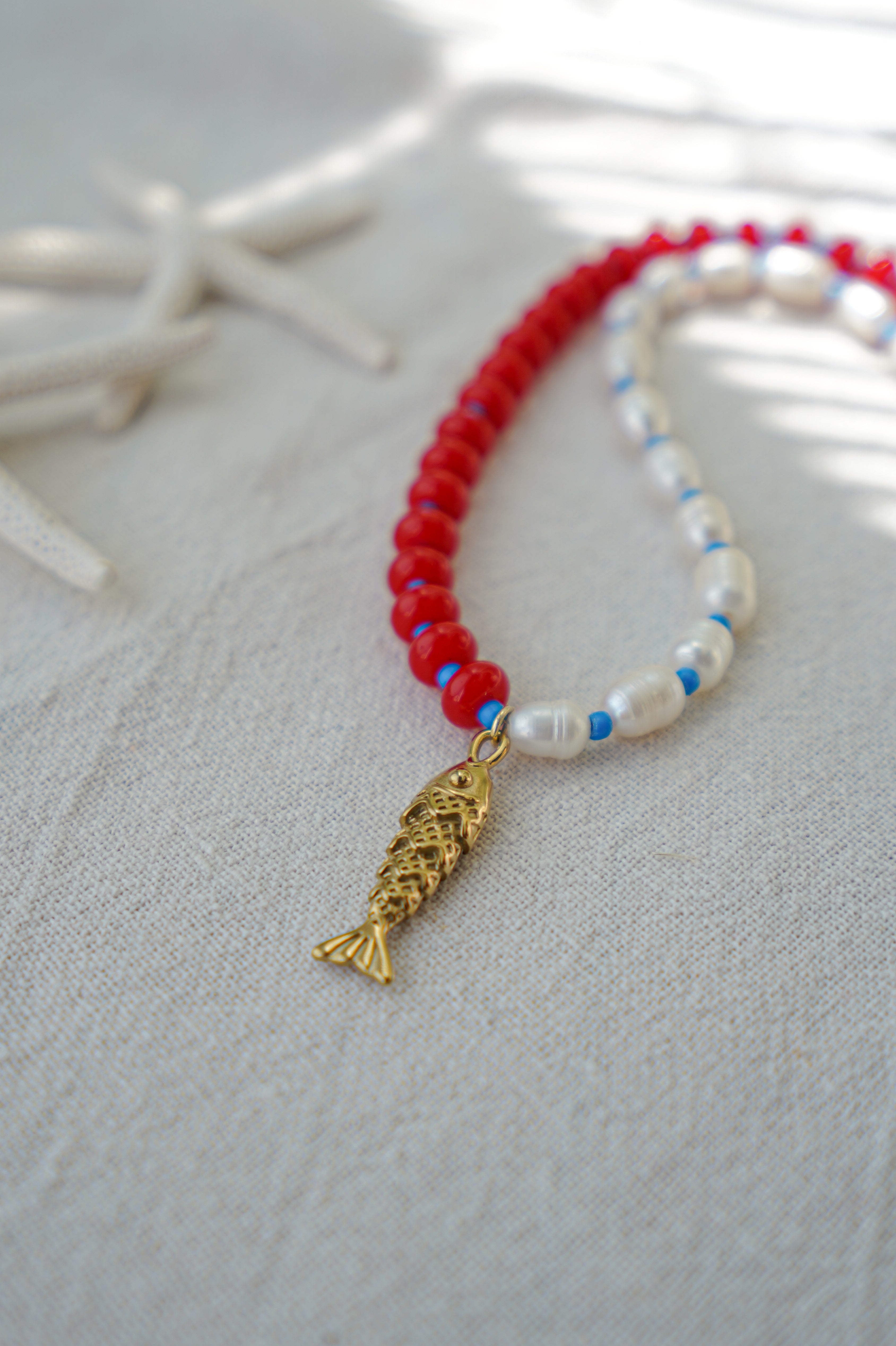 Collar piedras azules y rojas