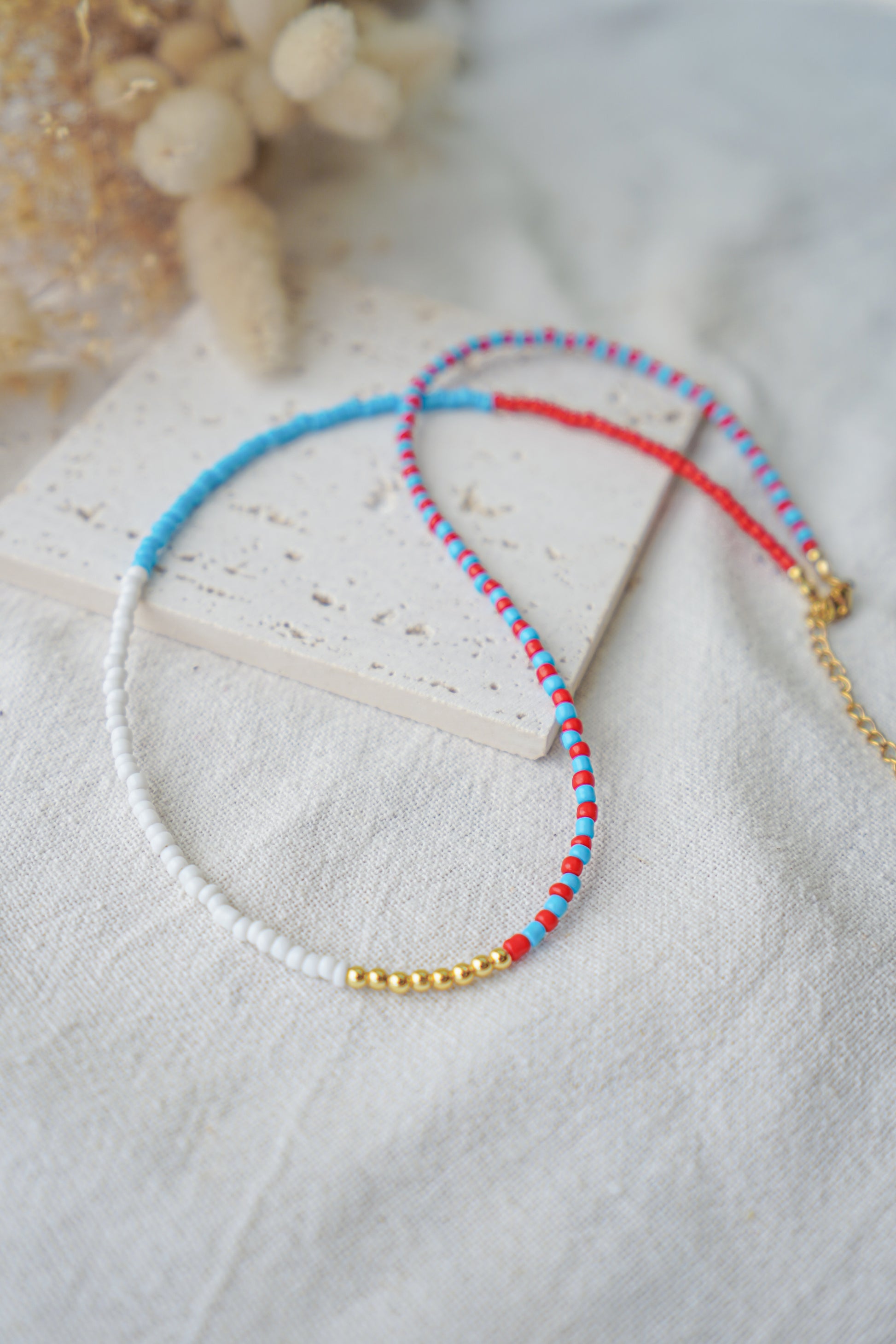 Collar EOS (azul cian, blanco & rojo escarlata)