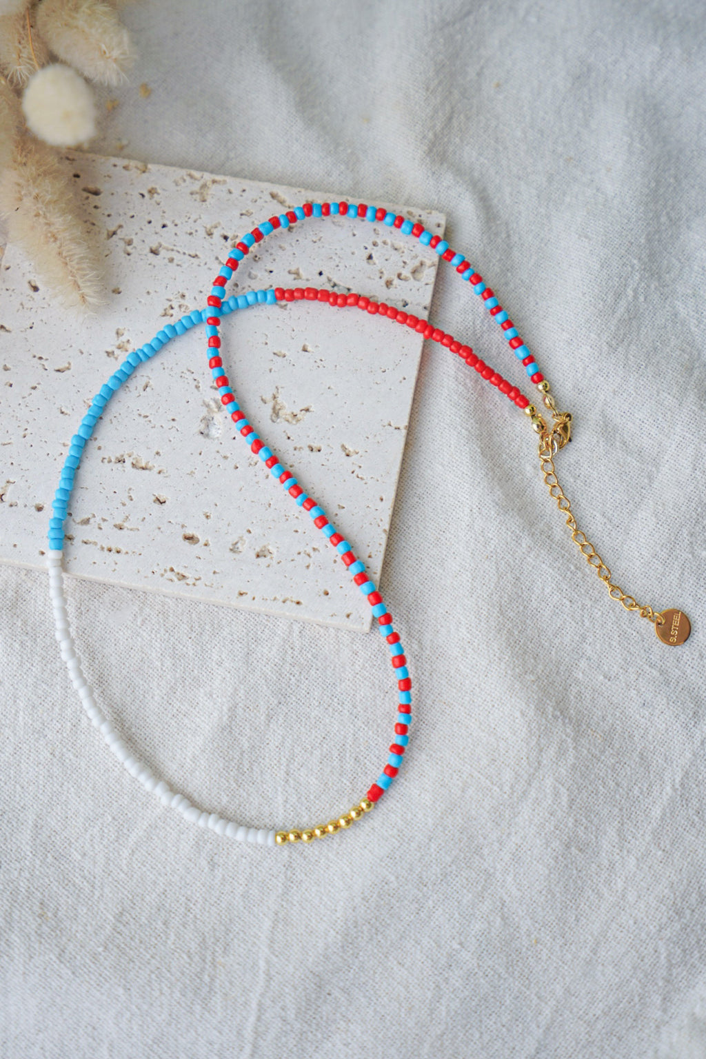 Collar EOS (azul cian, blanco & rojo escarlata)