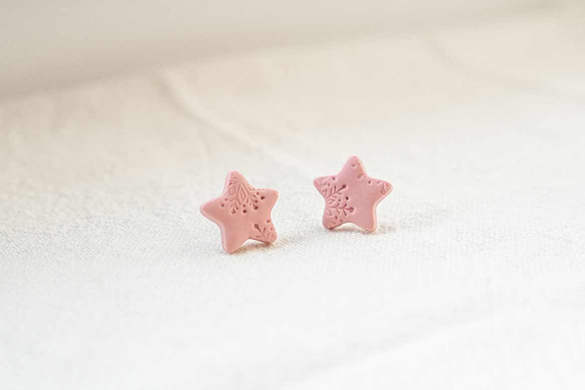 Pendientes estrella de Navidad rosa pastel