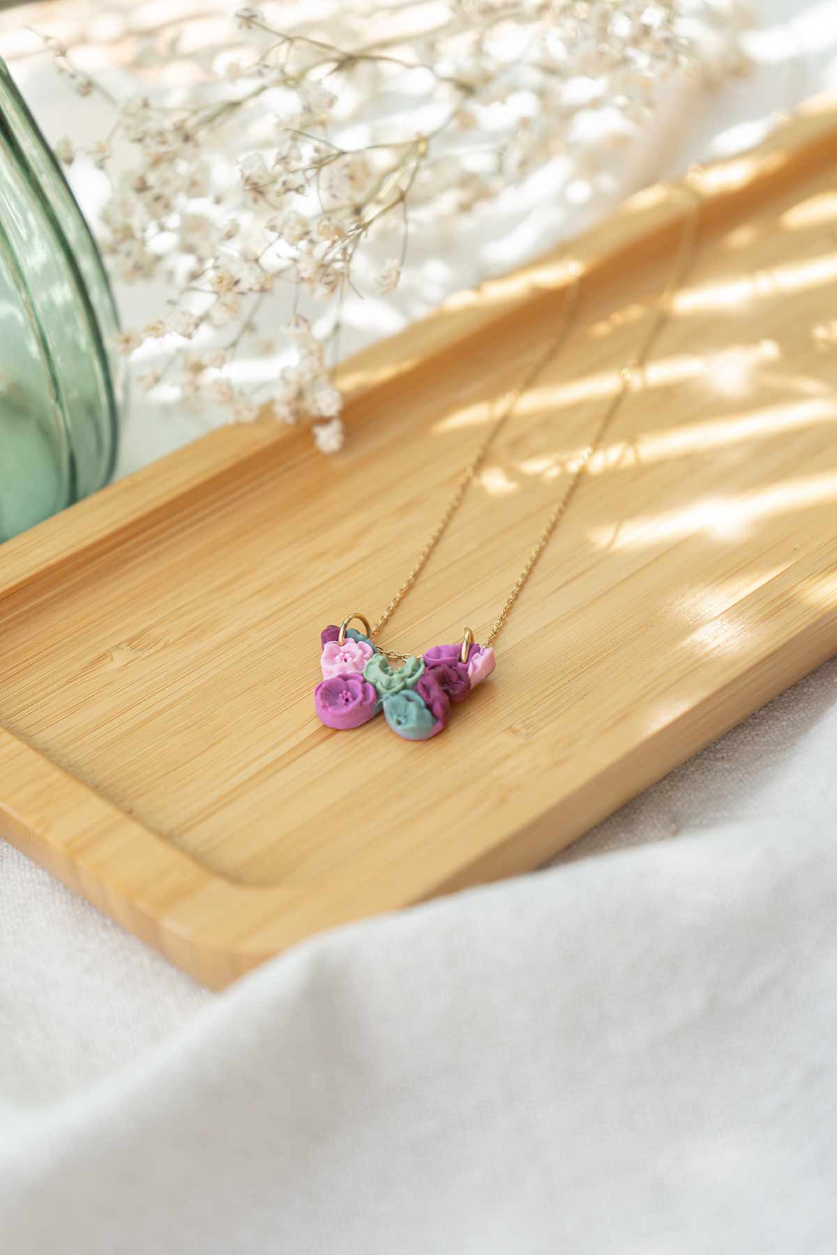 Colgante mariposa de flores