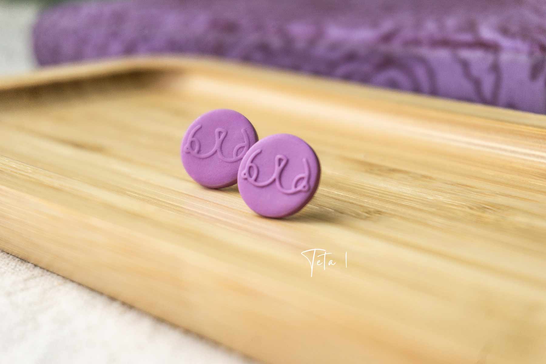 Pendientes Tetas violetas 1