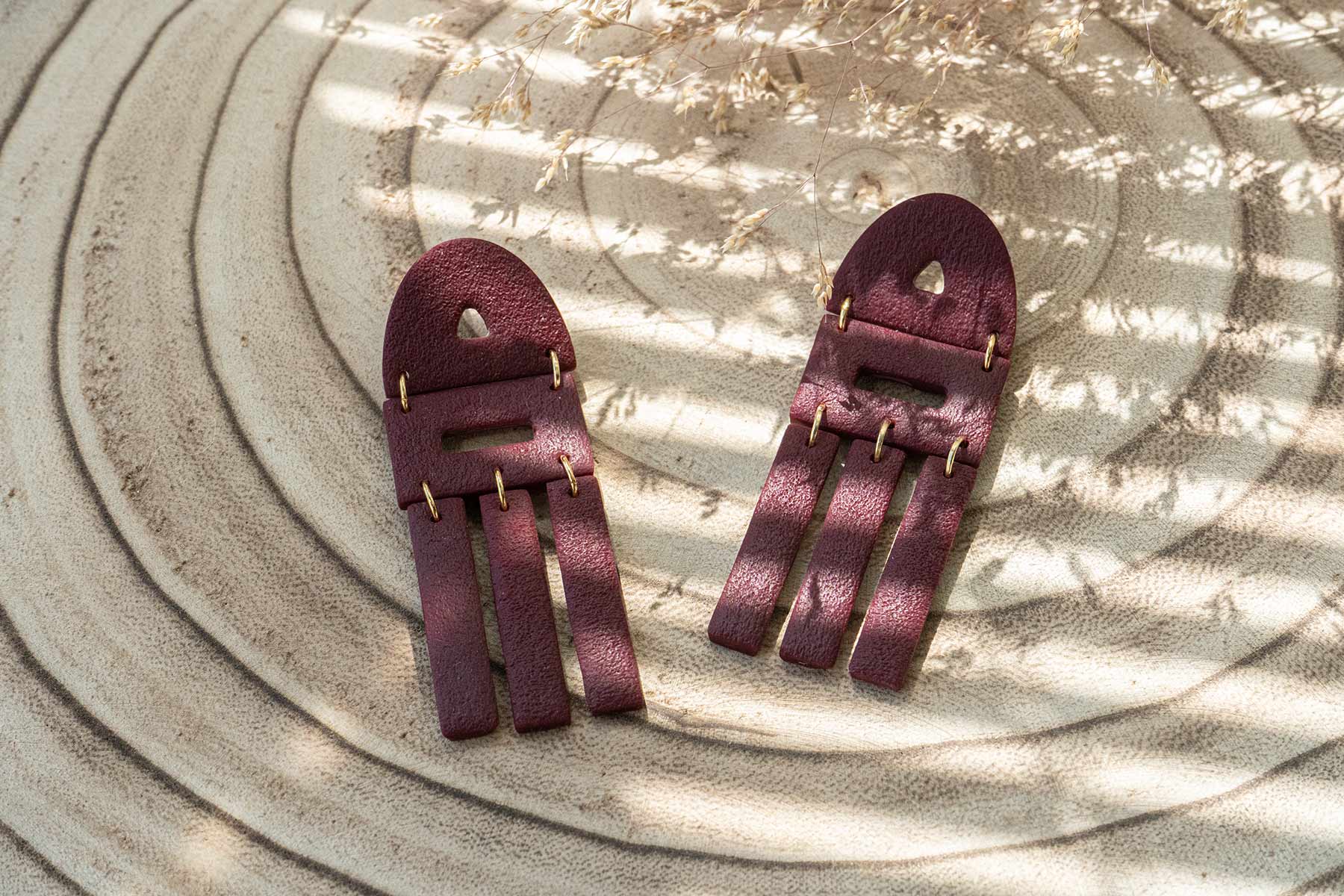 Pendientes grandes geométricos otoñales burdeos