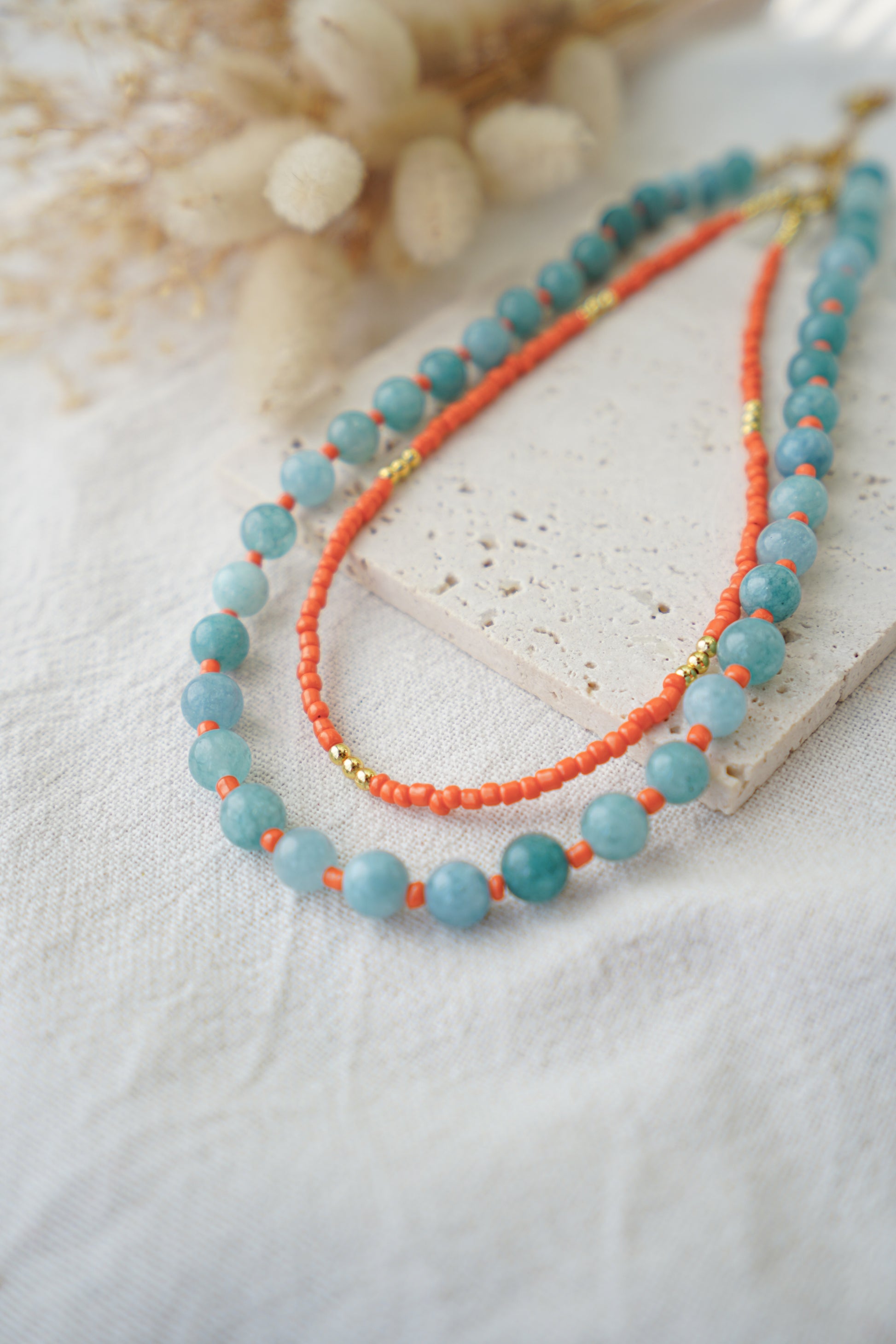 Collar piedras azules y naranjas