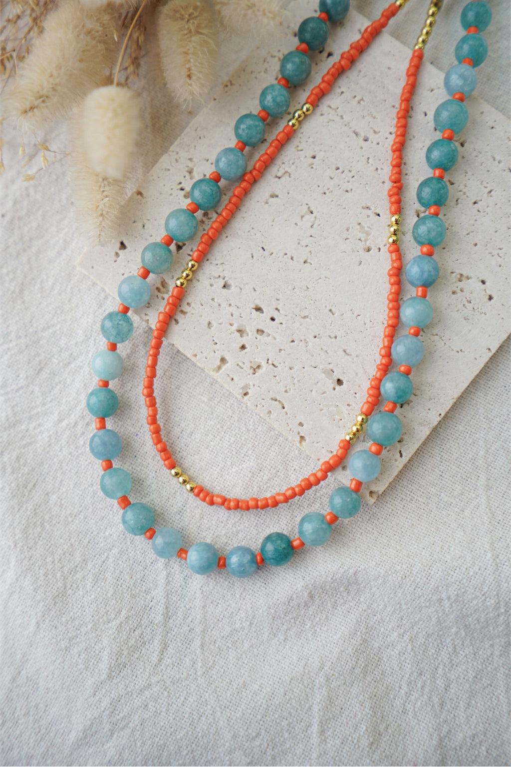 Collar piedras azules y naranjas
